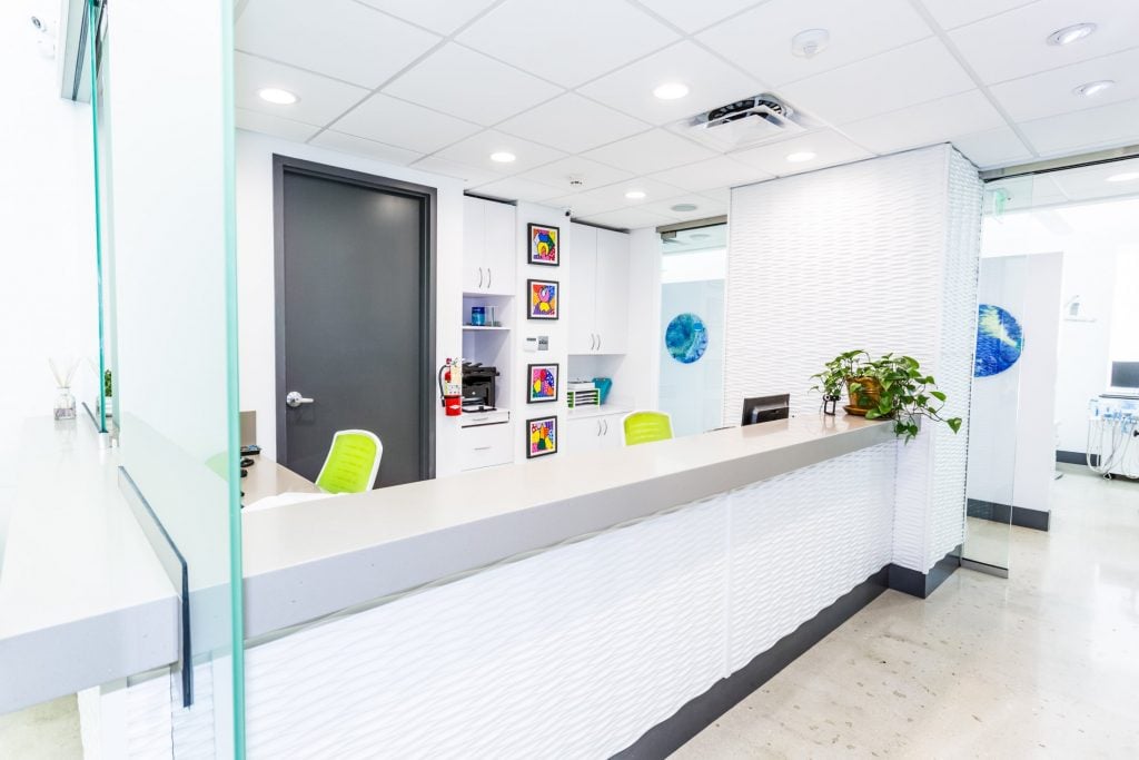 {PRACTICE_NAME} office front desk
